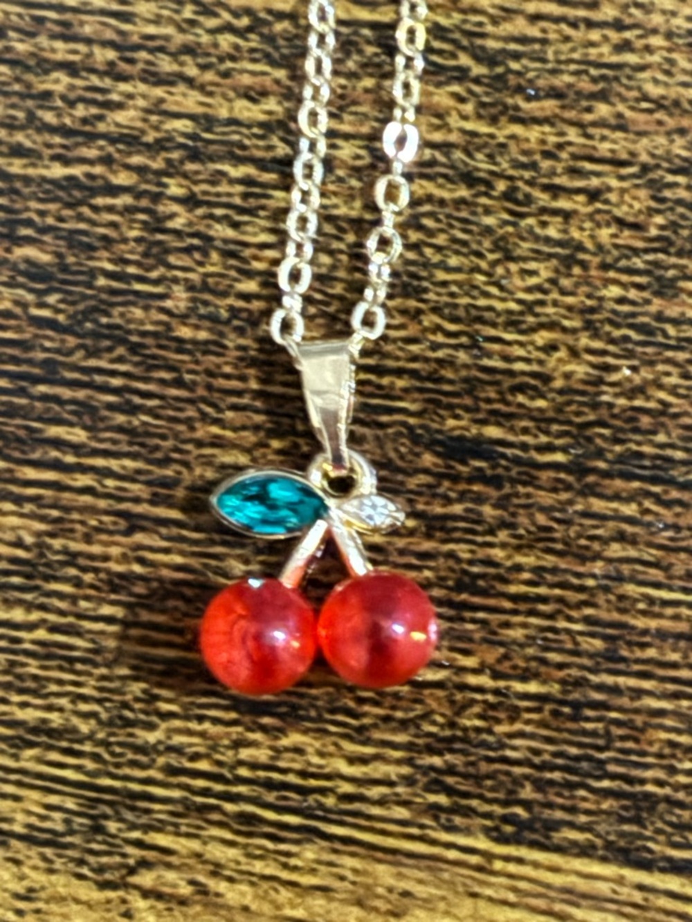 Gold-Tone Cherry Pendant Necklace with Red and Green Accents